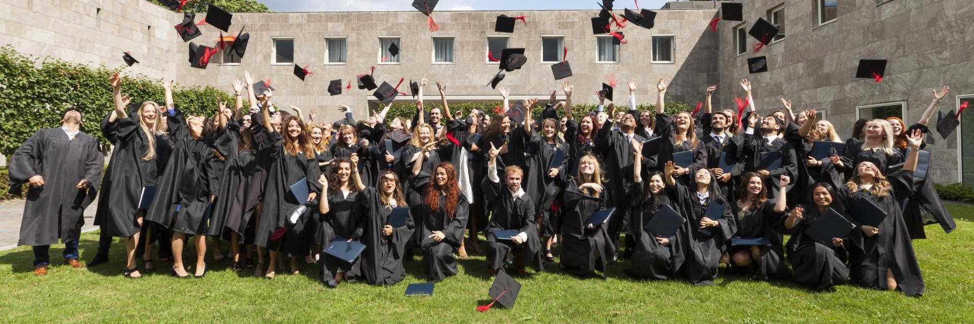 Master's students at their graduation ceremony