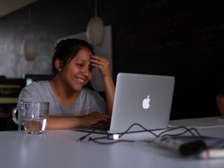 Girl on laptop, photo by Frank Romero