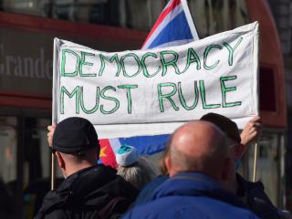 democracy must rule banner